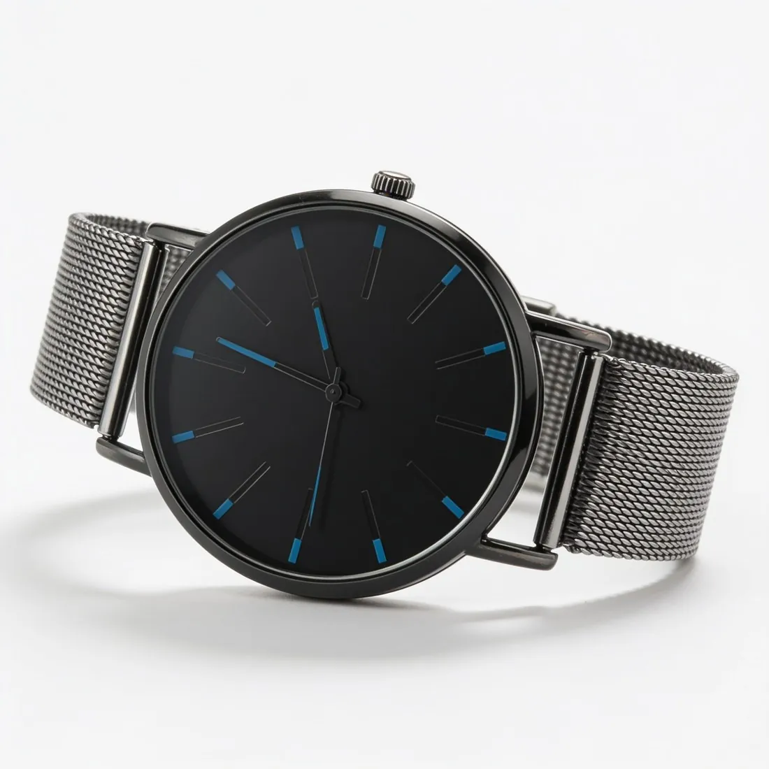 Black-dial watch with a mesh strap on white, three-quarter view